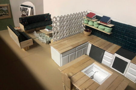 kitchen view #3 angled towards the living room of urban oasis model unit